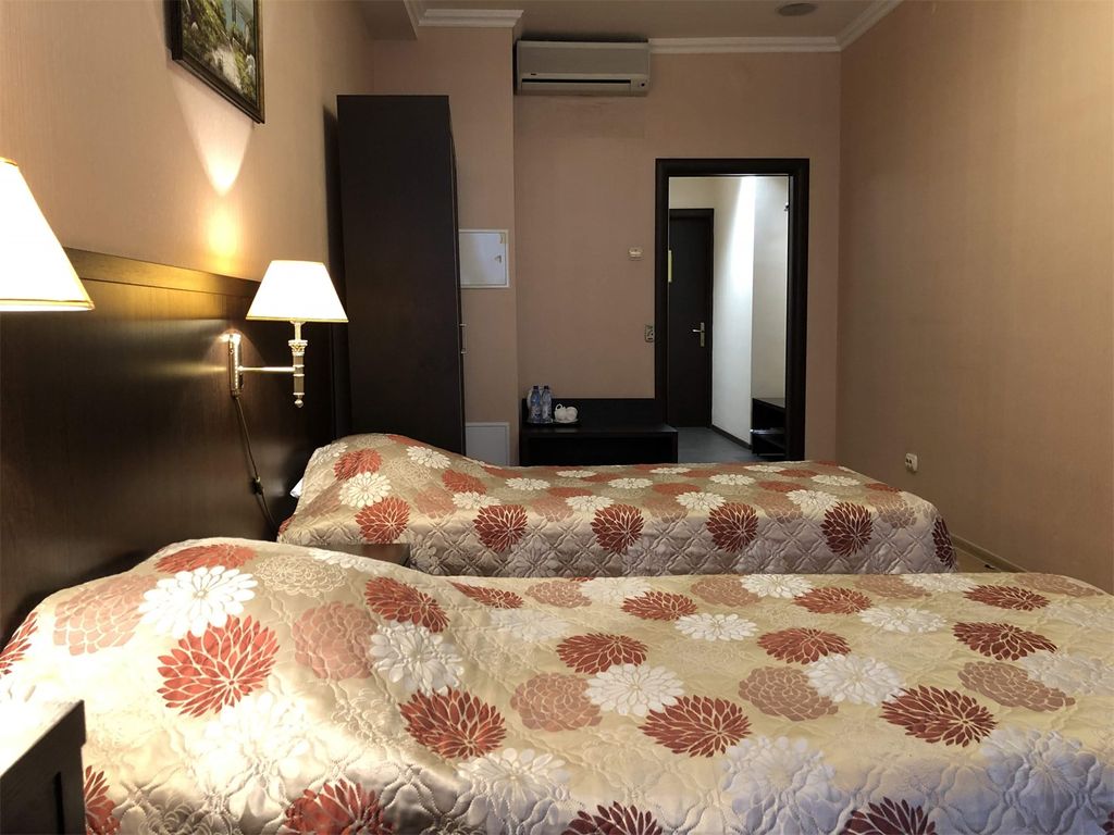 Двухместный номер с 2 отдельными кроватями стандарт