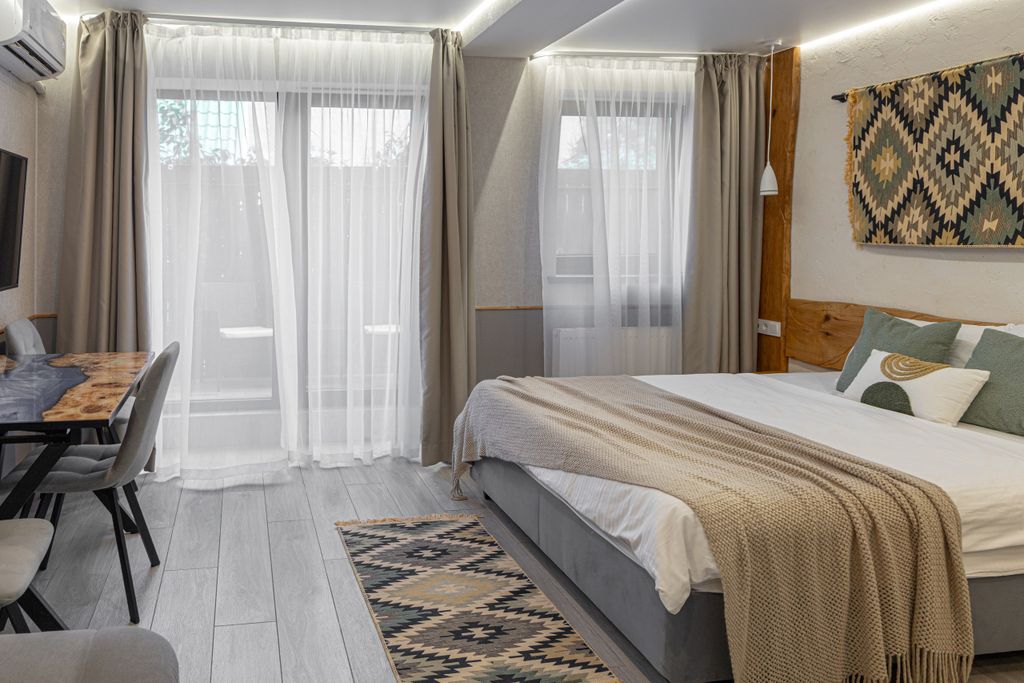 Двухместный номер с 1 кроватью и с двуспальным диваном Люкс Горы