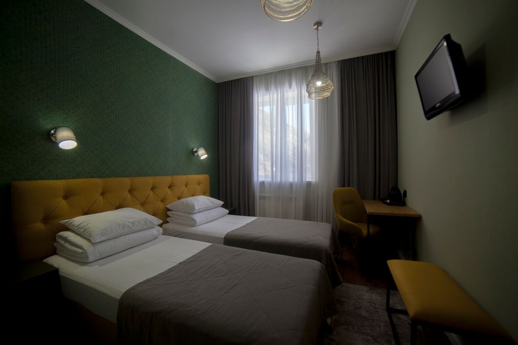 Двухместный номер с 2 отдельными кроватями стандартный на 1м этаже