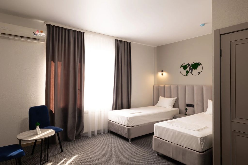 Двухместный номер с 2 отдельными кроватями стандарт