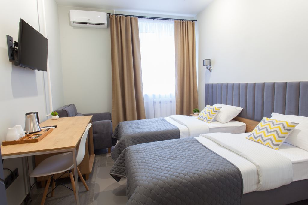 Двухместный номер с 2 отдельными кроватями стандарт