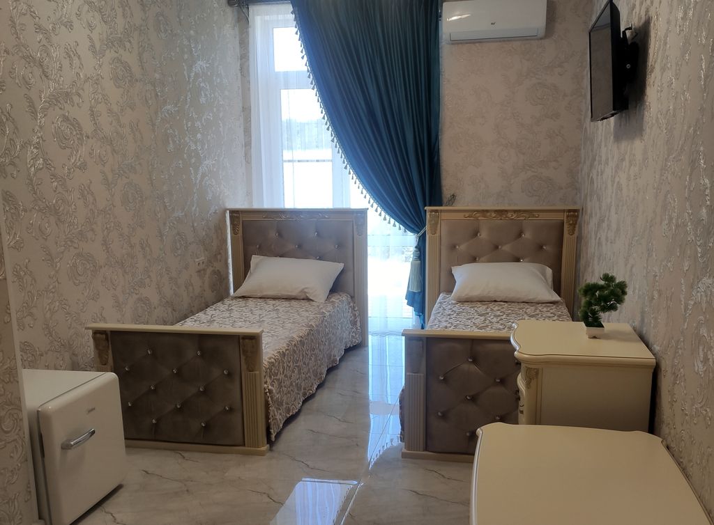 Двухместный номер с 2 отдельными кроватями стандарт