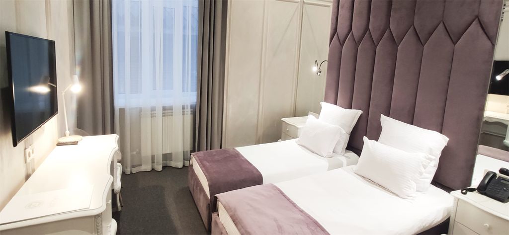 Двухместный номер с 2 отдельными кроватями Улучшенный