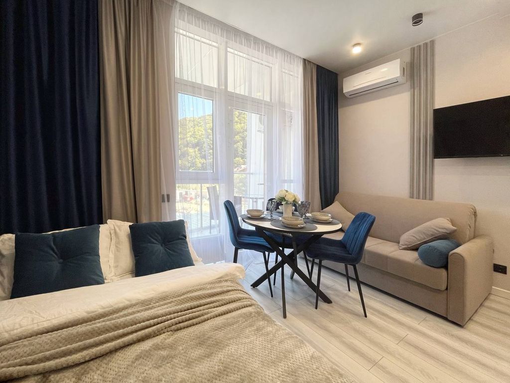 Апартаменты студия с видом на город