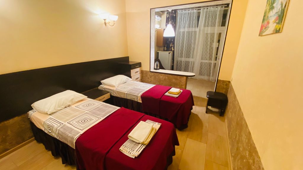 Двухместный номер с 2 отдельными кроватями Улучшенный с 2 раздельными кроватями