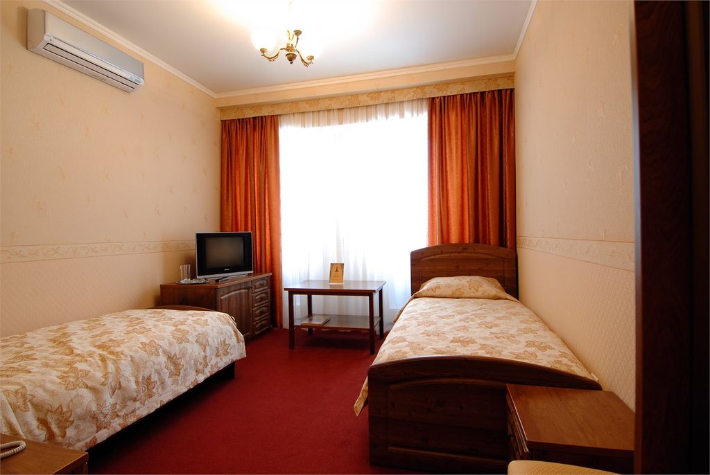 Двухместный номер с 2 отдельными кроватями стандарт