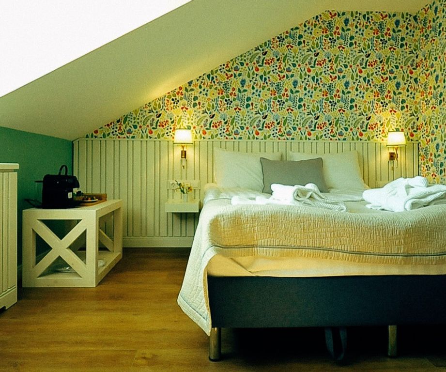 Трёхместный номер люкс Паасо