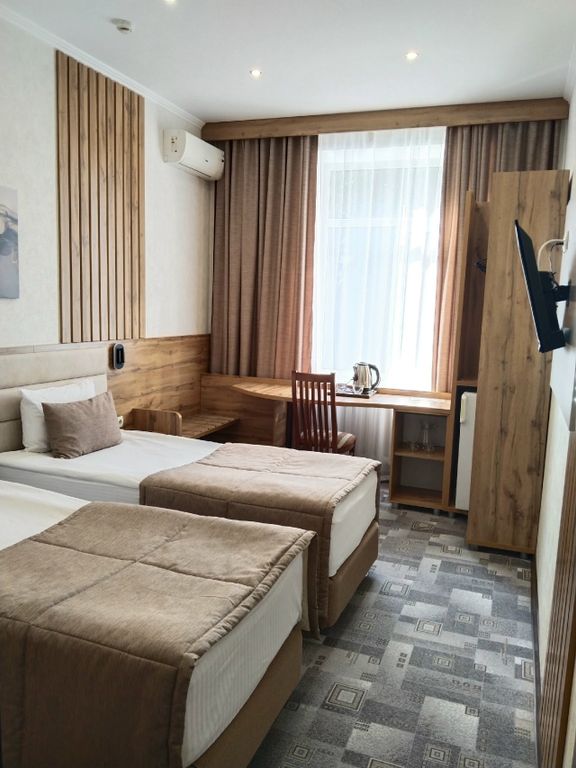 Двухместный номер с 2 отдельными кроватями стандарт