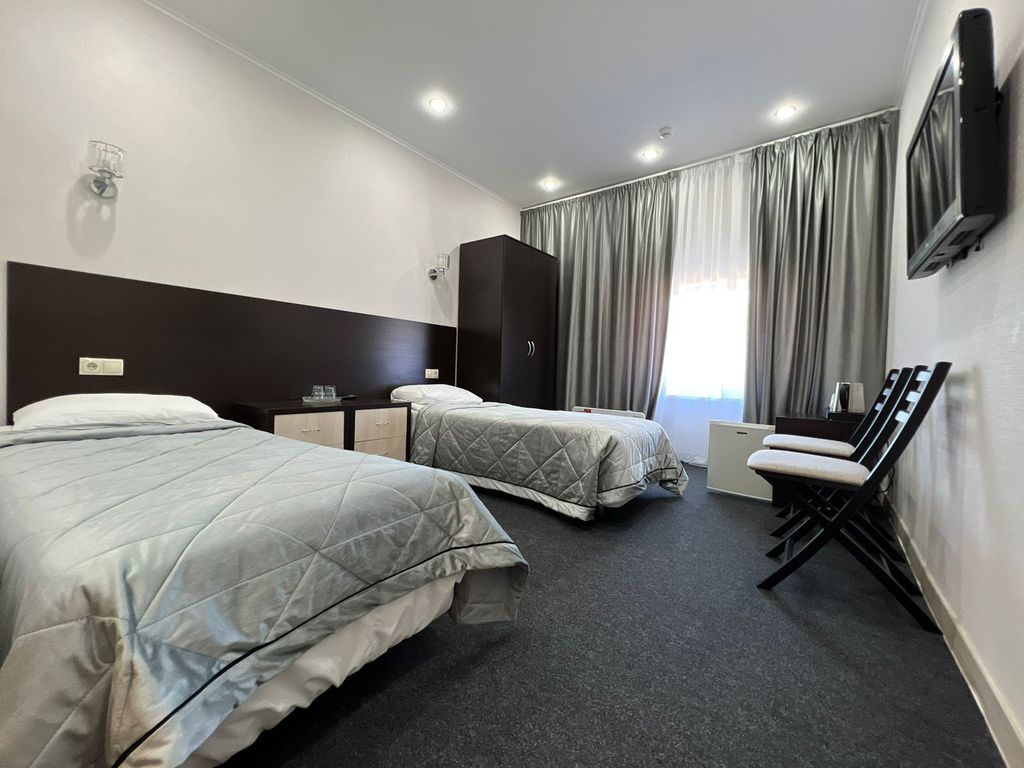 Двухместный номер с 2 отдельными кроватями Стандарт