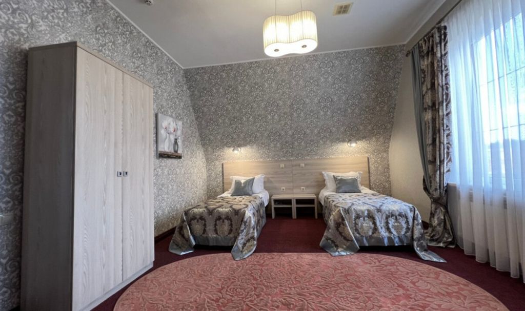 Двухместный номер с 2 отдельными кроватями люкс