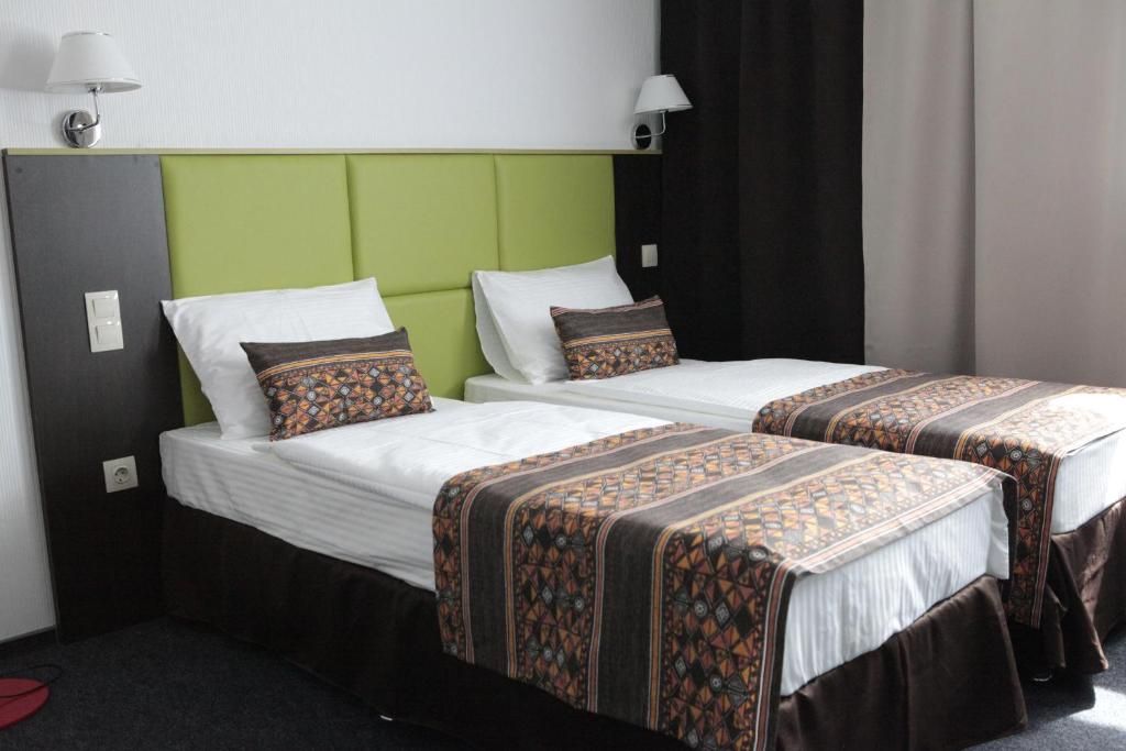 Трёхместный номер улучшенный комфорт твин