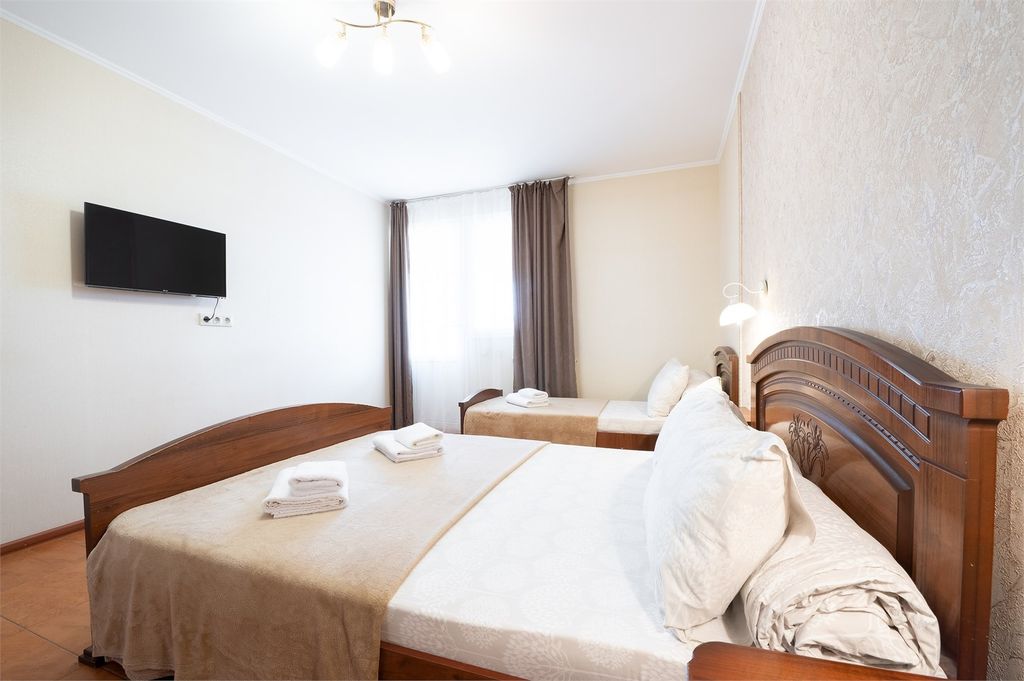 Трёхместный номер делюкс