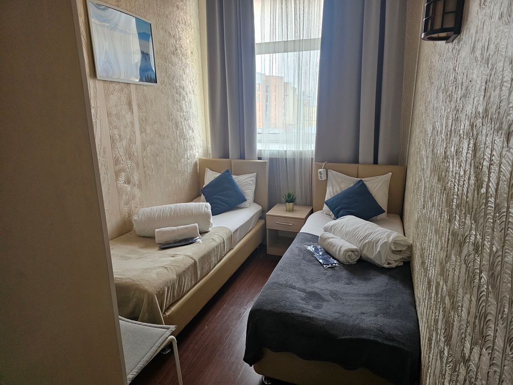 Двухместный номер с 2 отдельными кроватями категории стандарт