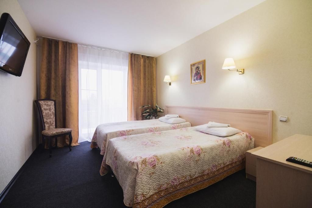 Двухместный номер с 2 отдельными кроватями комфорт