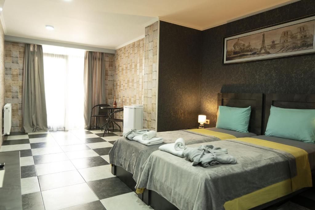 Двухместный номер с 2 отдельными кроватями стандарт