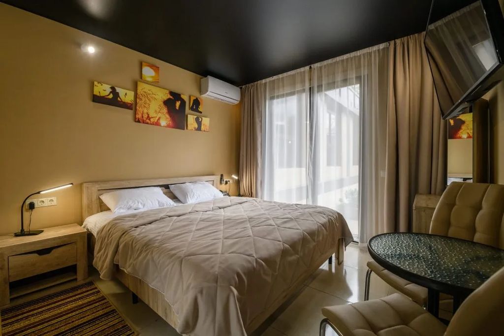 Двухместный номер с 1 кроватью премиум с выходом в сад 1 этаж