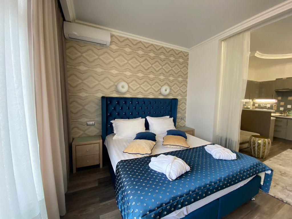 Апартаменты студия с балконом делюкс для четверых