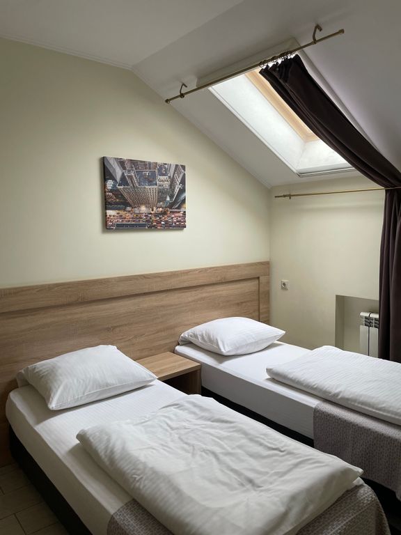 Двухместный номер с 2 отдельными кроватями стандарт