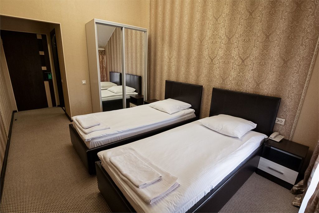 Двухместный номер с 2 отдельными кроватями стандарт