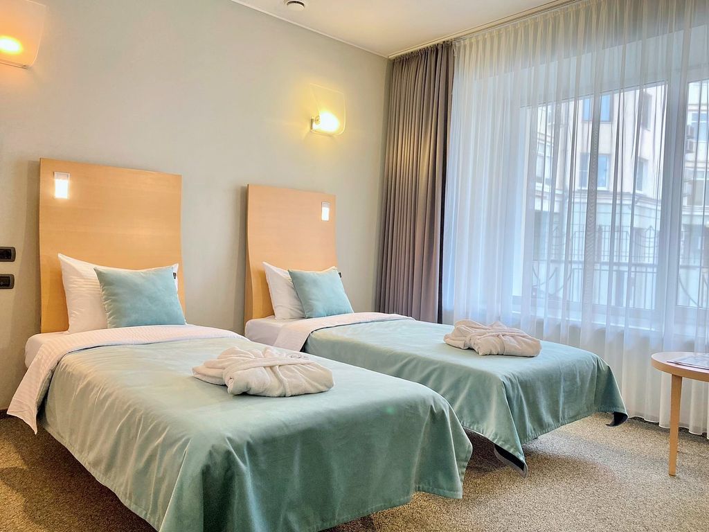 Двухместный номер с 2 отдельными кроватями Бизнес