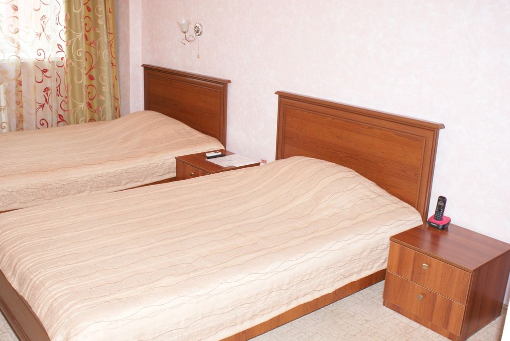 Двухместный номер с 2 отдельными кроватями Стандарт двухместный с двумя кроватями