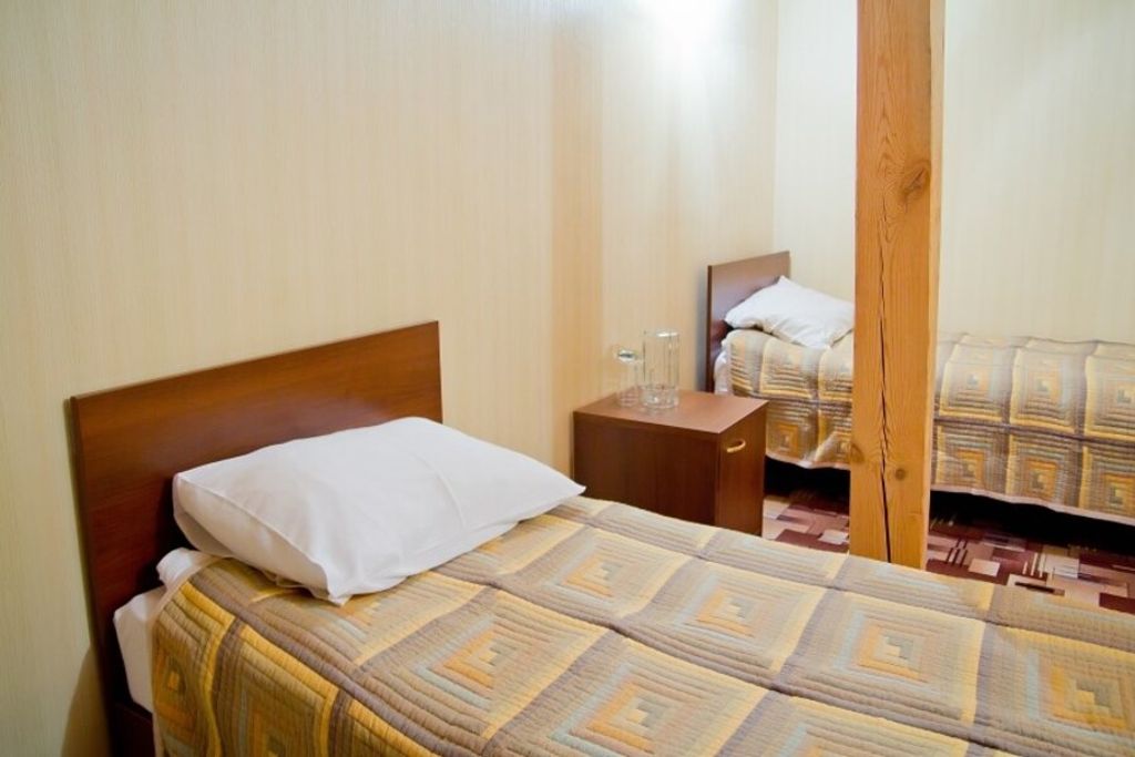 Трёхместный номер мансарда 510