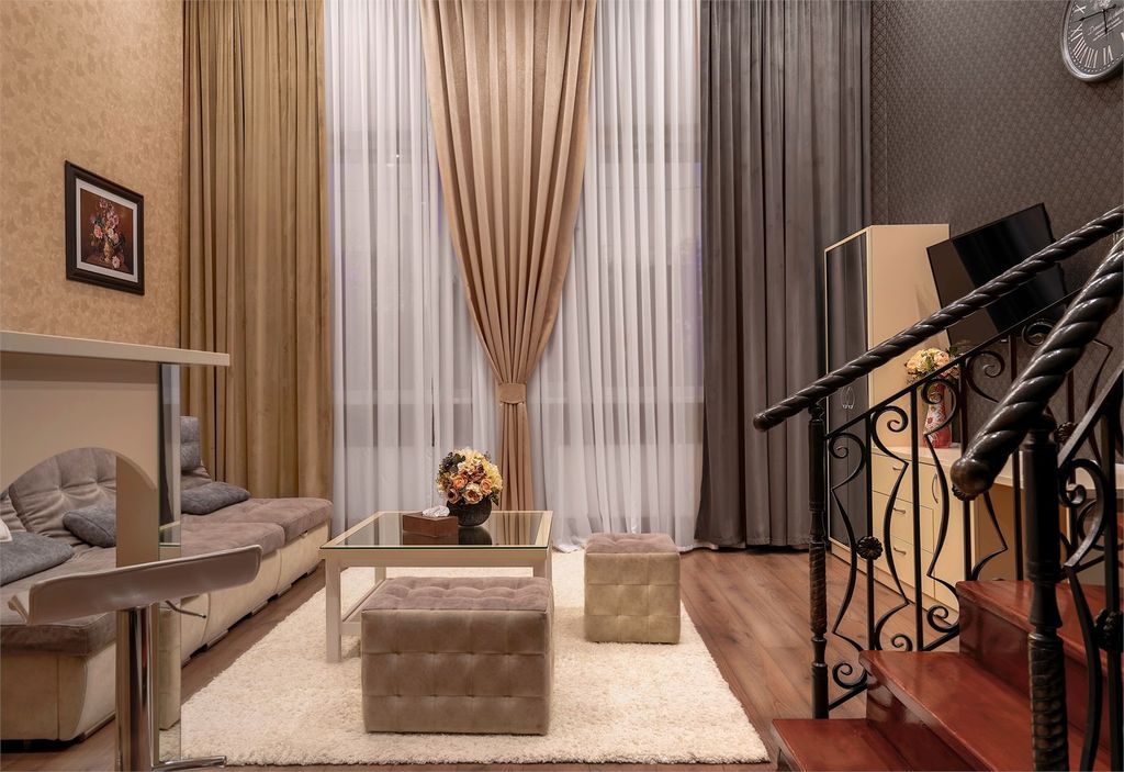 Четырёхместный номер двухуровневый люкс