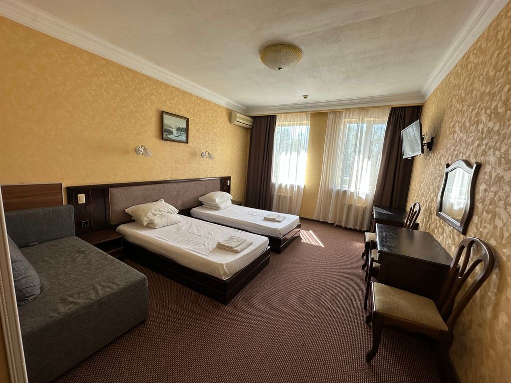 Двухместный номер с 2 отдельными кроватями улучшенный