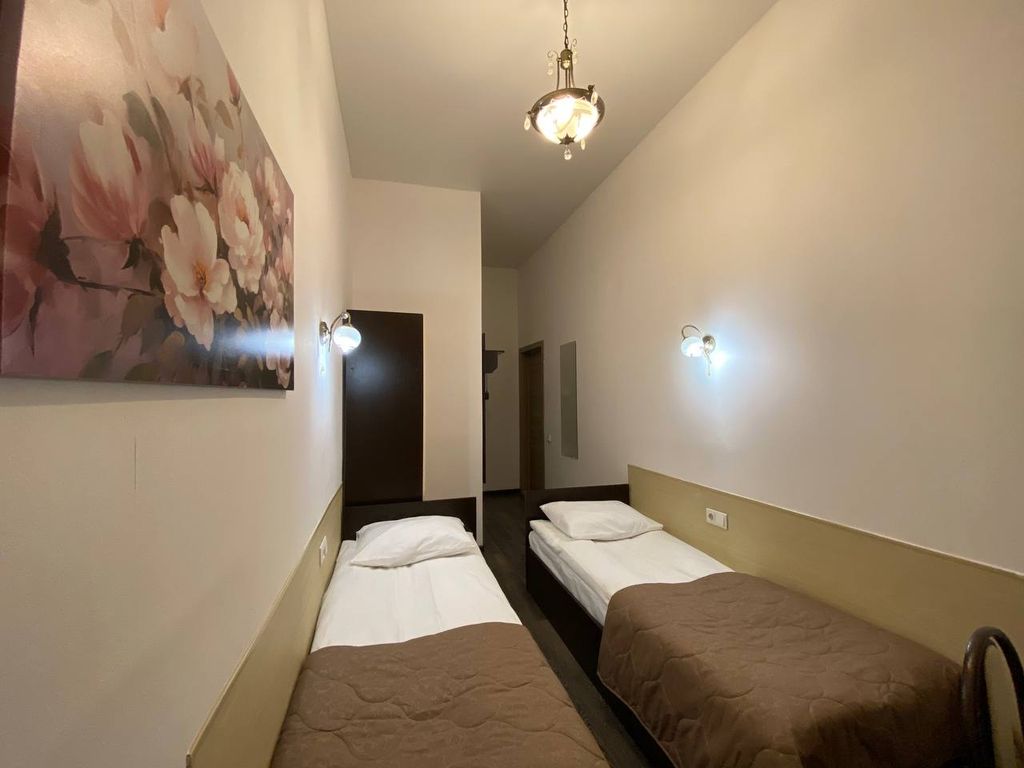 Двухместный номер с 2 отдельными кроватями с собственной ванной комнатой