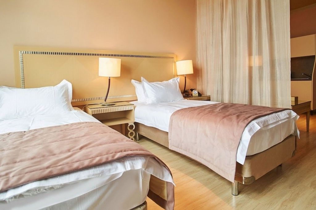 Двухместный номер с 2 отдельными кроватями улучшенный стандарт с видом на море