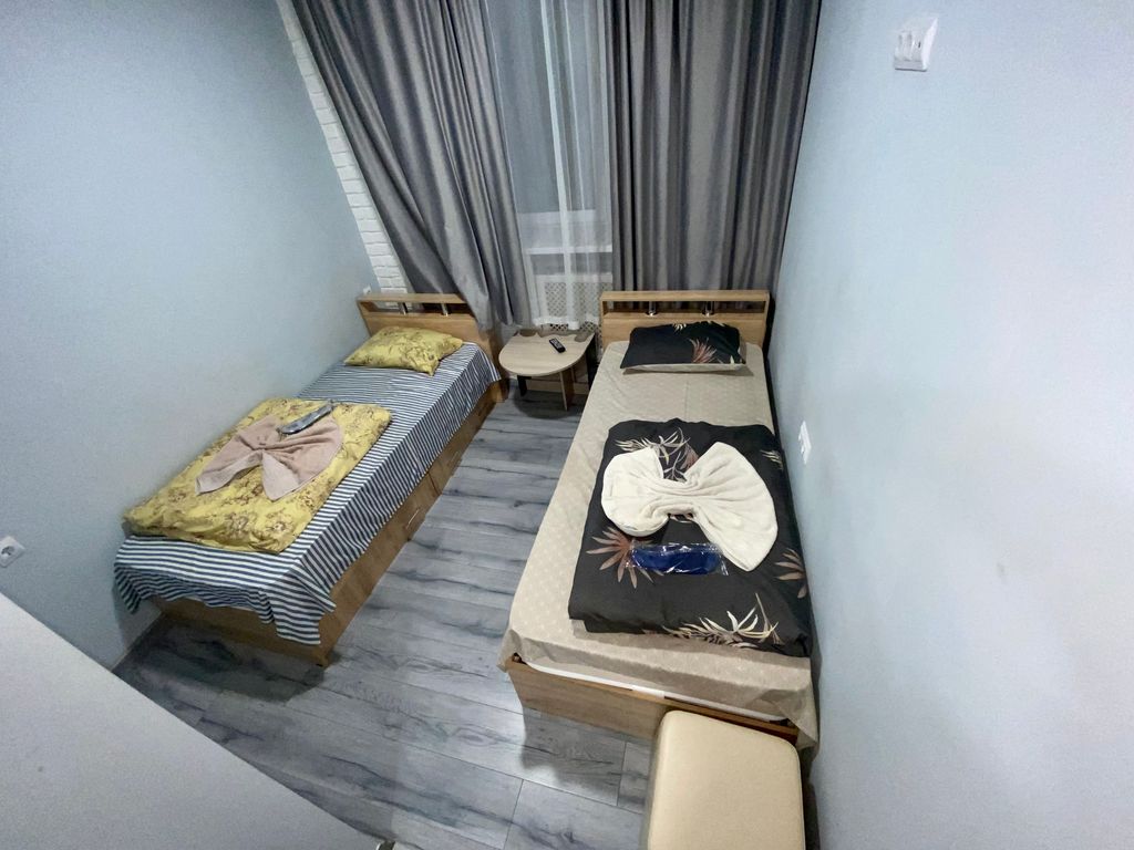 Двухместный номер с 2 отдельными кроватями улучшенный