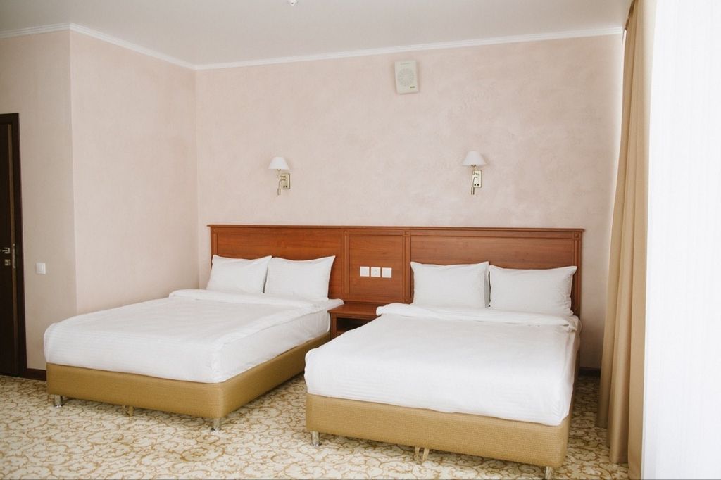 Четырёхместный номер улучшенный с 2 кроватями