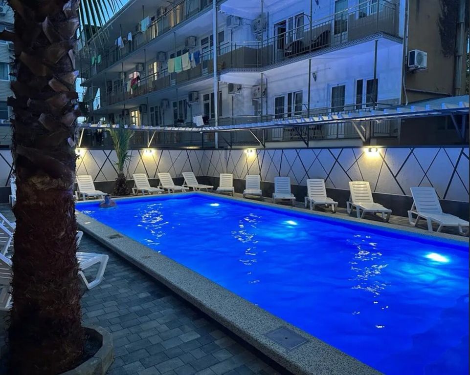 Трёхместный номер студио с балконом