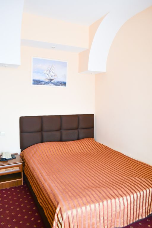 Трёхместный номер стандарт с балконом