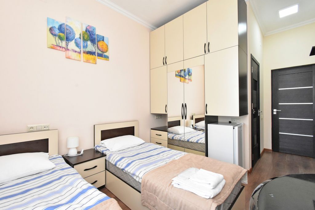 Двухместный номер с 2 отдельными кроватями стандарт