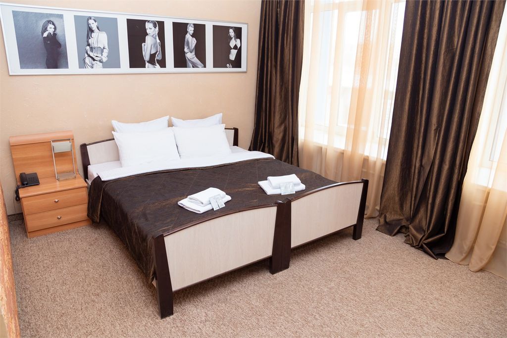 Семейный номер с кухней универсальный (джуниор сюит)