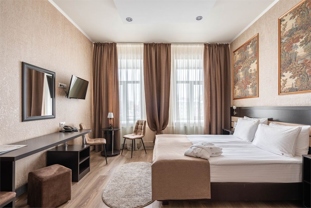 Четырёхместный номер Джуниор Сьют с 2-мя ванными комнатами