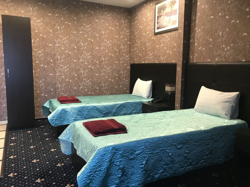 Двухместный номер с 2 отдельными кроватями стандарт