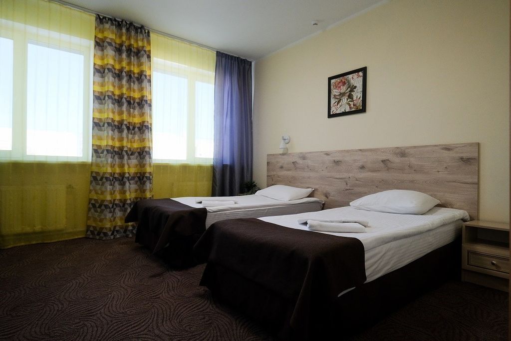 Двухместный номер с 2 отдельными кроватями стандарт