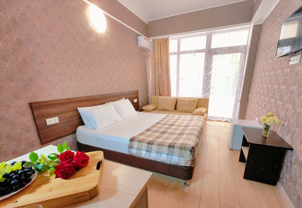 Четырёхместный номер комфорт с общей террасой