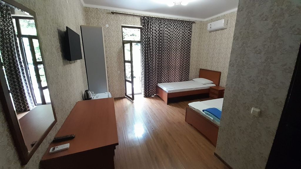 Двухместный номер с 2 отдельными кроватями делюкс с балконом и видом на горы