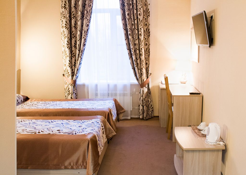 Двухместный номер с 2 отдельными кроватями стандарт