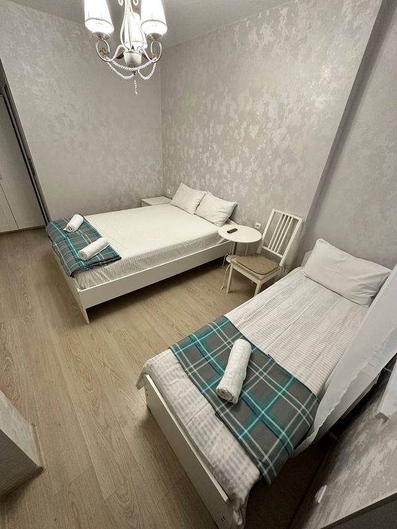 Трёхместный номер улучшенный с видом на город