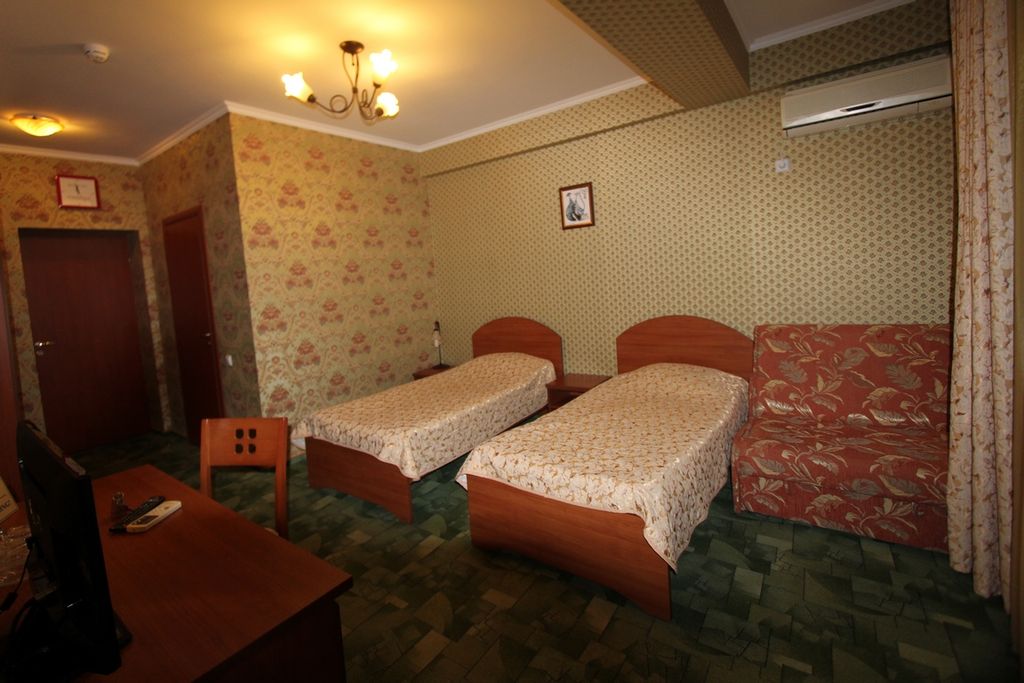 Двухместный номер с 2 отдельными кроватями эконом