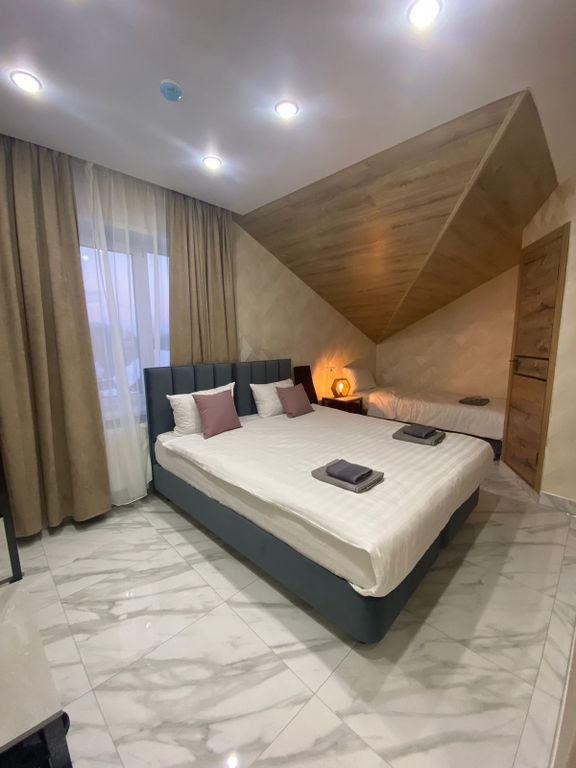 Двухместный номер с 2 отдельными кроватями улучшенный