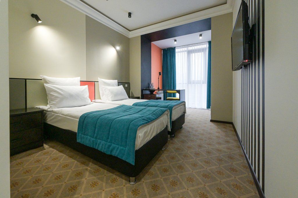 Двухместный номер с 1 кроватью или 2 отдельными кроватями стандарт