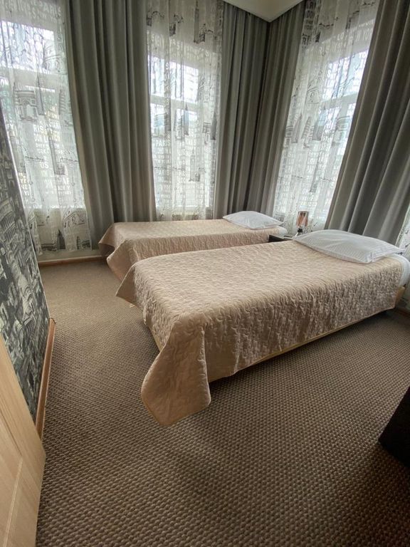 Двухместный номер с 2 отдельными кроватями стандарт