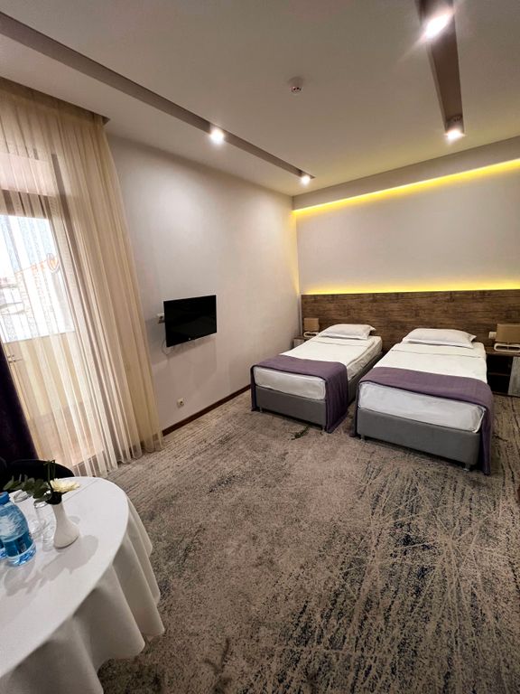 Двухместный номер с 2 отдельными кроватями улучшенный