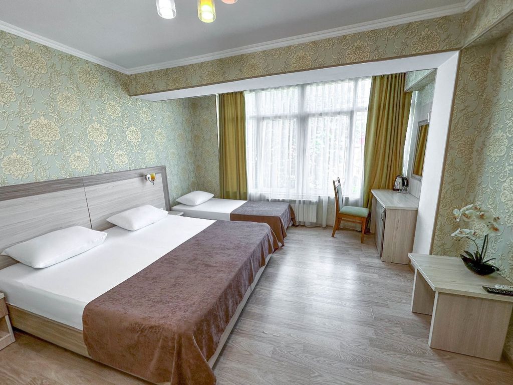 Трёхместный номер Комфорт