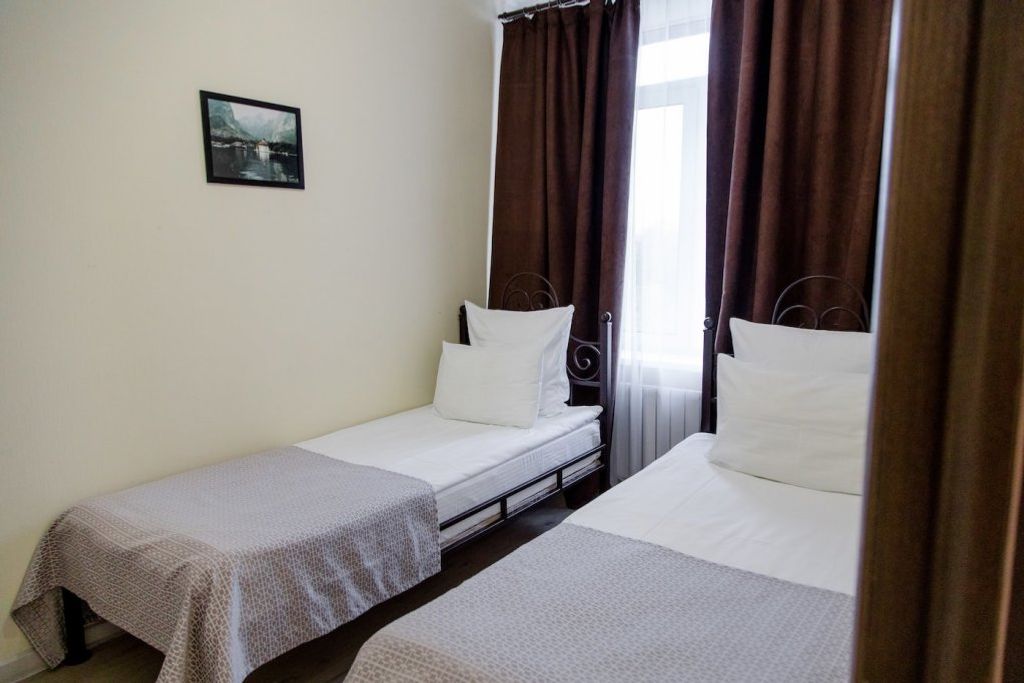 Двухместный номер с 2 отдельными кроватями полулюкс